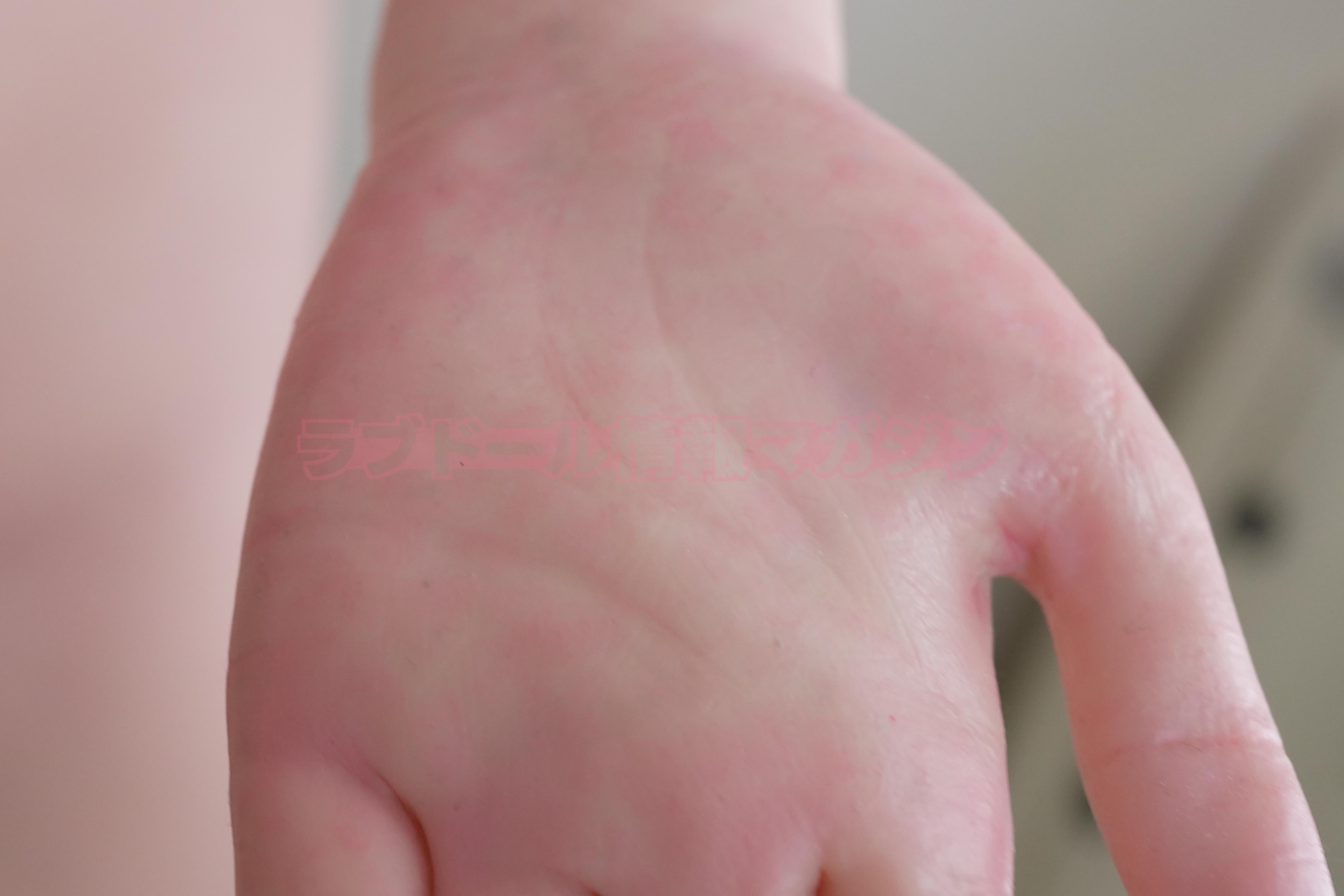 Close-up of a hand with realistic skin texture, showing details like veins and the natural shape of fingers.